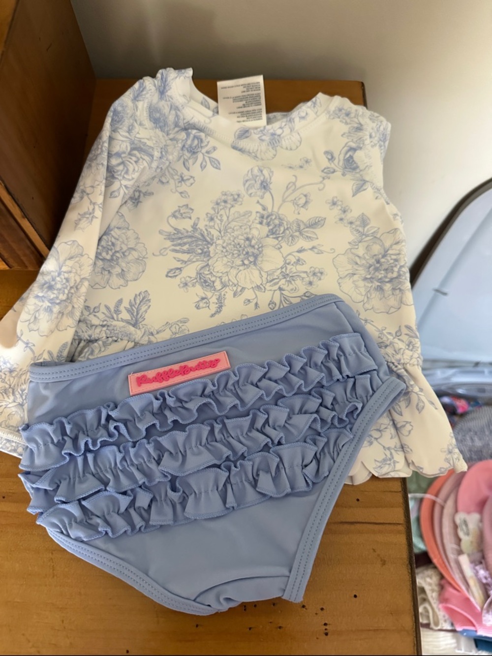 Ruffle Butts Light Blue Ruffle Swim Bottoms with White Floral Rash Guard